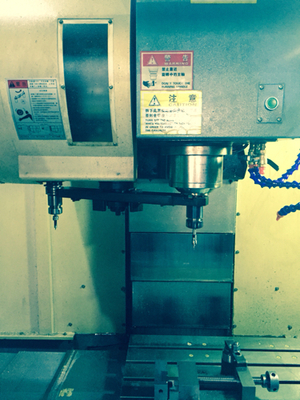 CNCM70加工中心換刀時刀被按到手動導(dǎo)致刀臂卡住怎么復(fù)位?_360問答